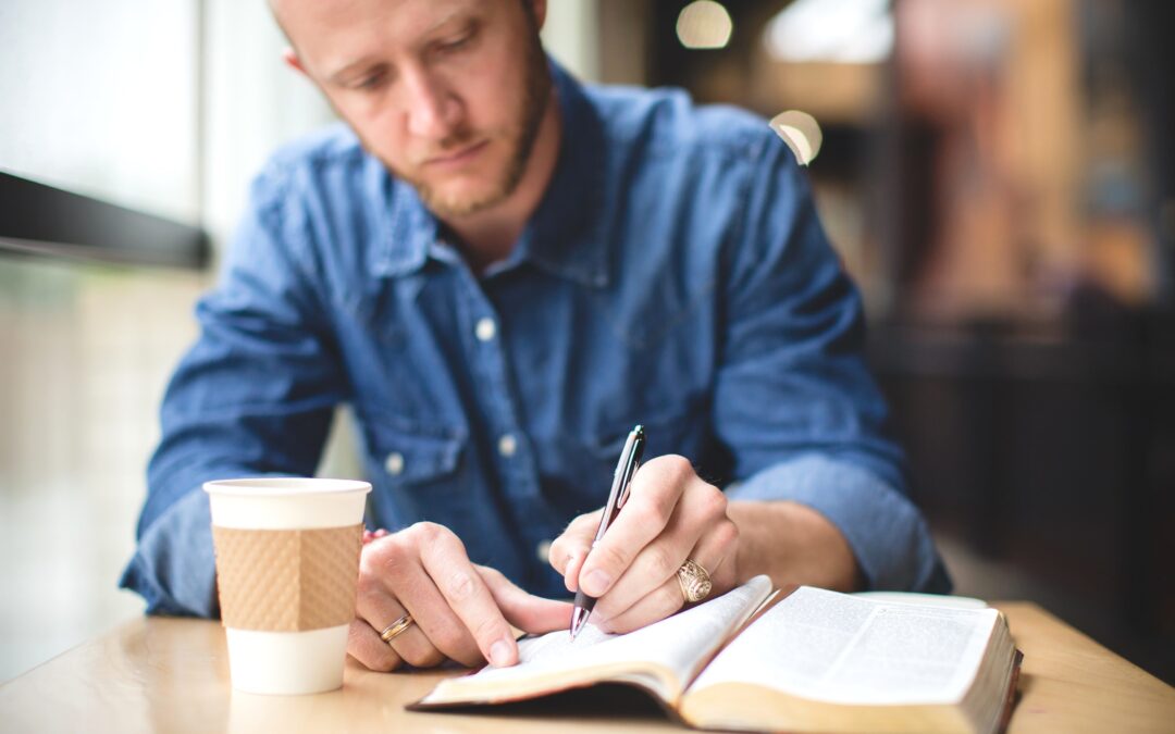 business man writing a nonfiction book
